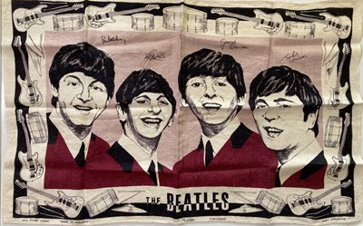 Lot 565 - THE BEATLES - TEA TOWEL/DRESS MATERIAL.