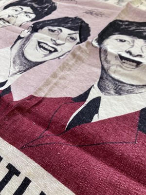 Lot 565 - THE BEATLES - TEA TOWEL/DRESS MATERIAL.