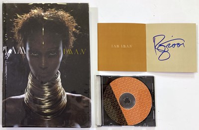 Lot 105 - IMAN - SIGNED BOOK INC CD BOOKLET SIGNED BY BOWIE.