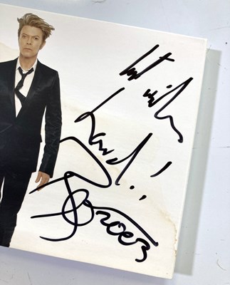 Lot 107 - DAVID BOWIE - SIGNED CD.