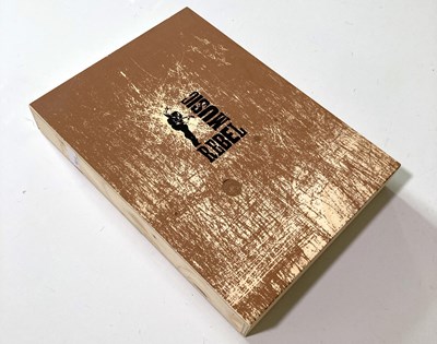 Lot 79 - BOB MARLEY REBEL MUSIC GENESIS PUBLICATIONS - DELUXE COPY SIGNED BY ERIC CLAPTON.