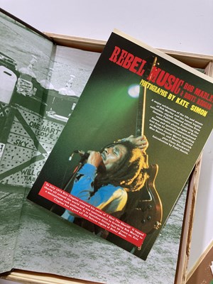 Lot 79 - BOB MARLEY REBEL MUSIC GENESIS PUBLICATIONS - DELUXE COPY SIGNED BY ERIC CLAPTON.