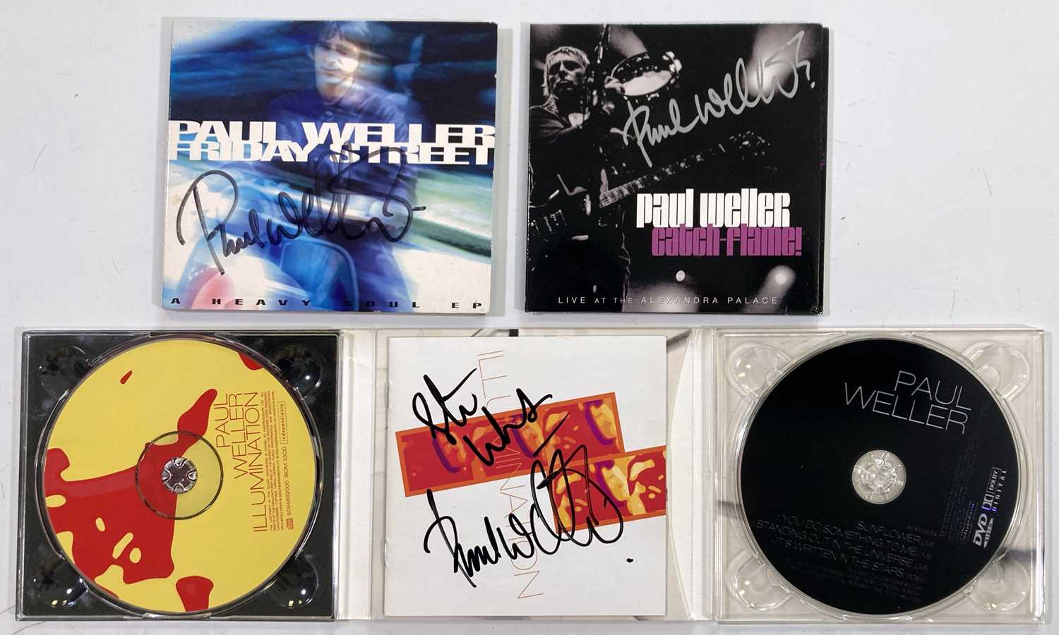 Lot 456 - THE JAM - PAUL WELLER SIGNED CDS.