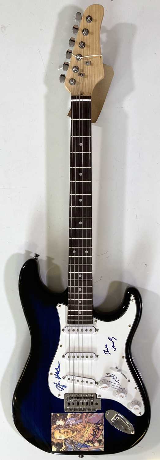 Lot 421 - THE SEX PISTOLS - A SIGNED ELECTRIC GUITAR.