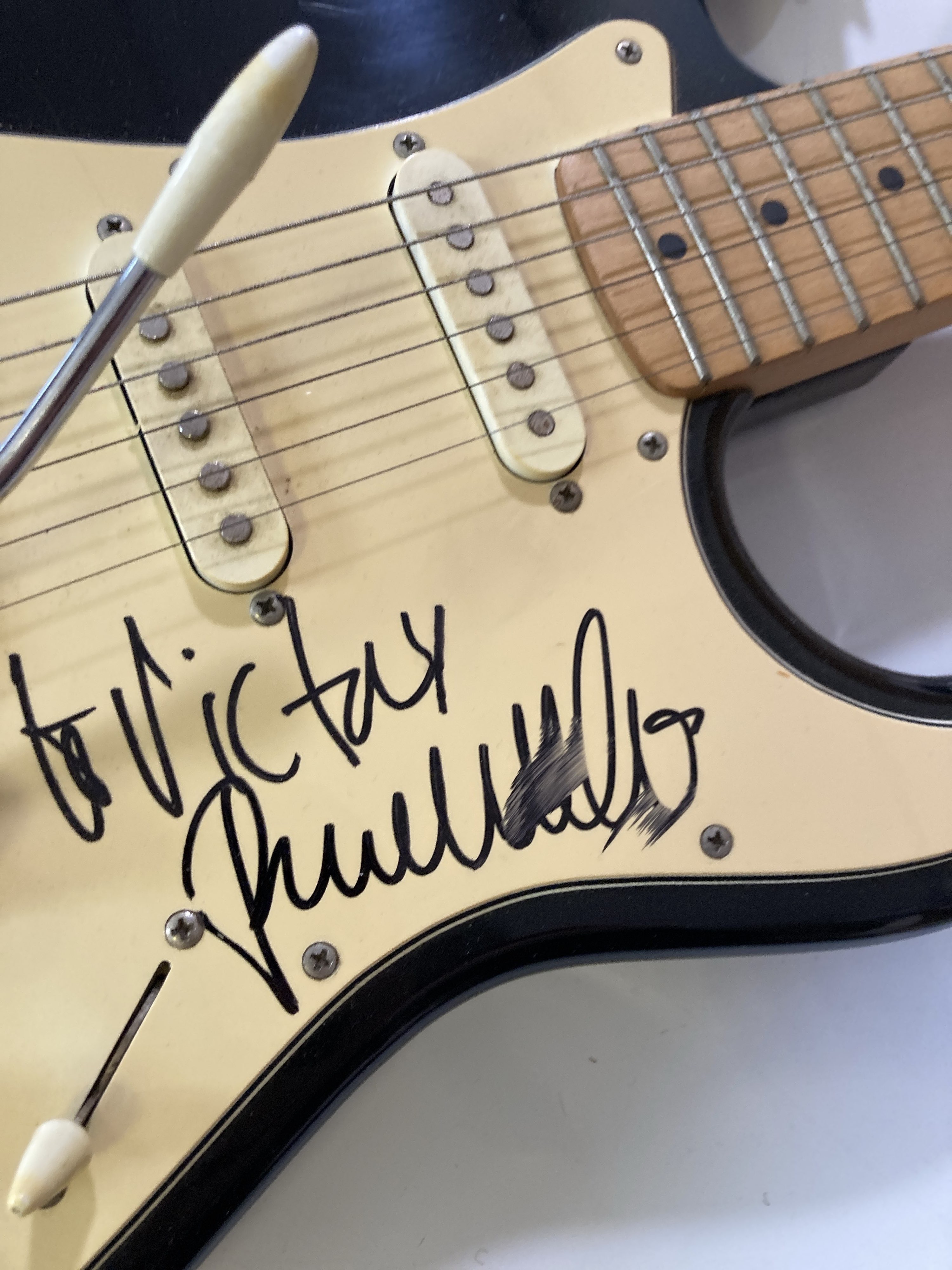 Lot 457 THE JAM / PAUL WELLER SIGNED GUITAR.