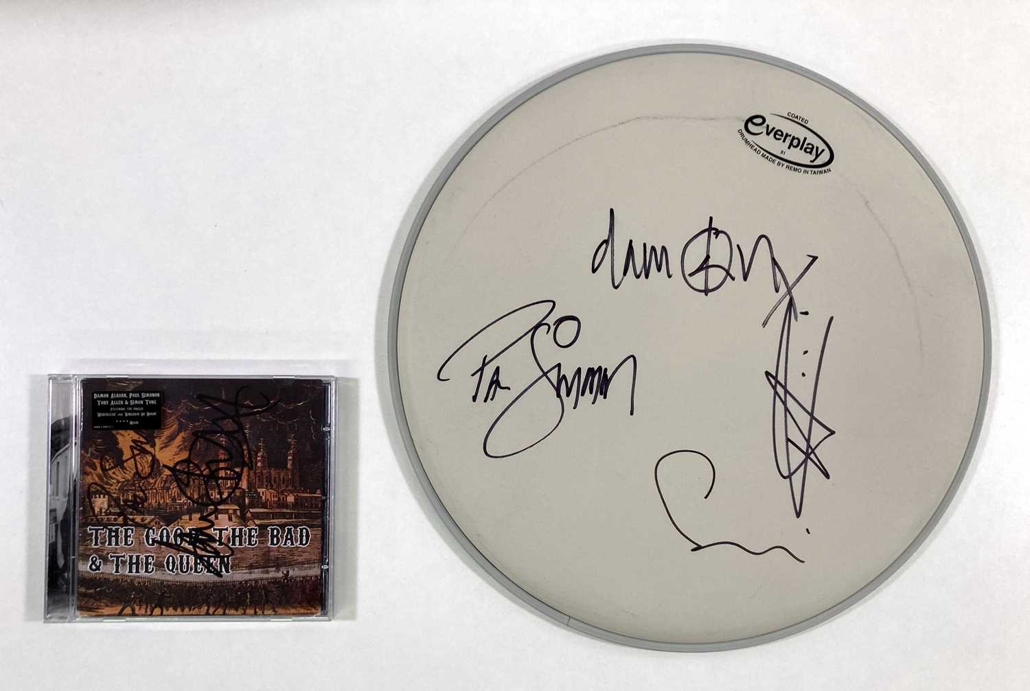 Lot 272 - DRUM SKIN SIGNED BY MEMBERS OF GOOD, BAD AND THE QUEEN INC ALBARN / SIMONON.