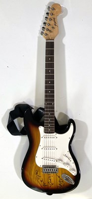 Lot 280 - GENESIS - GUITAR SIGNED BY MIKE RUTHERFORD AND STEVE HACKETT.