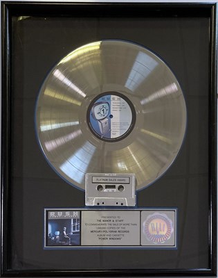 Lot 311 - RUSH - A PLATINUM RIAA AWARD.