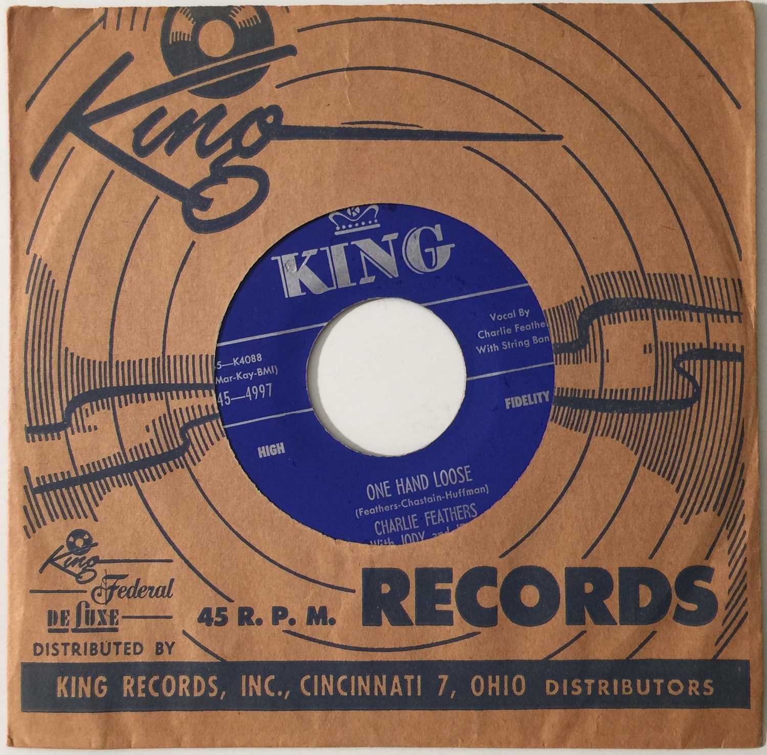 Lot 207 - CHARLIE FEATHERS - BOTTLE TO THE BABY / ONE HAND LOOSE 7" (KING - 4997)