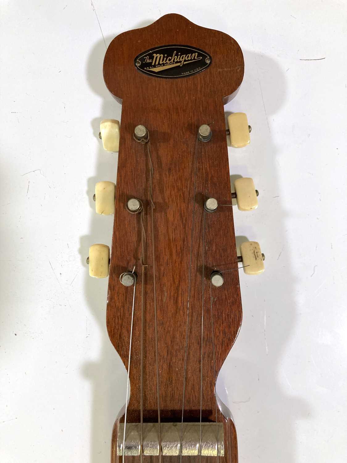 Lot 36 HAWAIIAN LAP STEEL GUITAR BY 'THE MICHIGAN'.