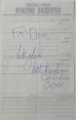 Lot 302 - KATE BUSH - SIGNED PAGE.