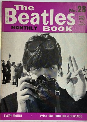 Lot 254 - GEORGE HARRISON - A SIGNED BEATLES MONTHLY BOOK.