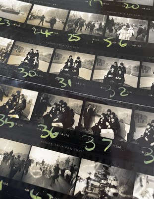 Lot 232 - THE BEATLES - CONTACT SHEET OF PRESS IMAGES C 1965/6.