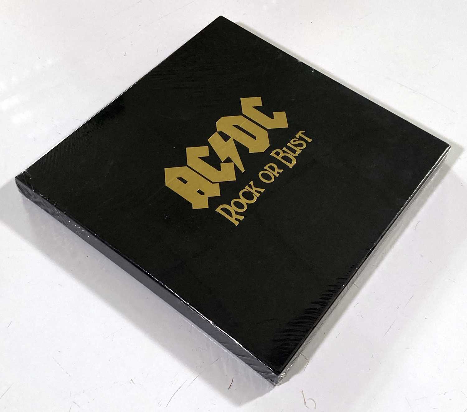 Lot 76 - AC/DC - ROCK OR BUST ORIGINAL PHOTO BOOK - STILL SEALED.