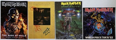 Lot 309 - IRON MAIDEN - SIGNED TOUR PROGRAMMES.