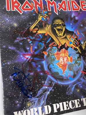 Lot 309 - IRON MAIDEN - SIGNED TOUR PROGRAMMES.