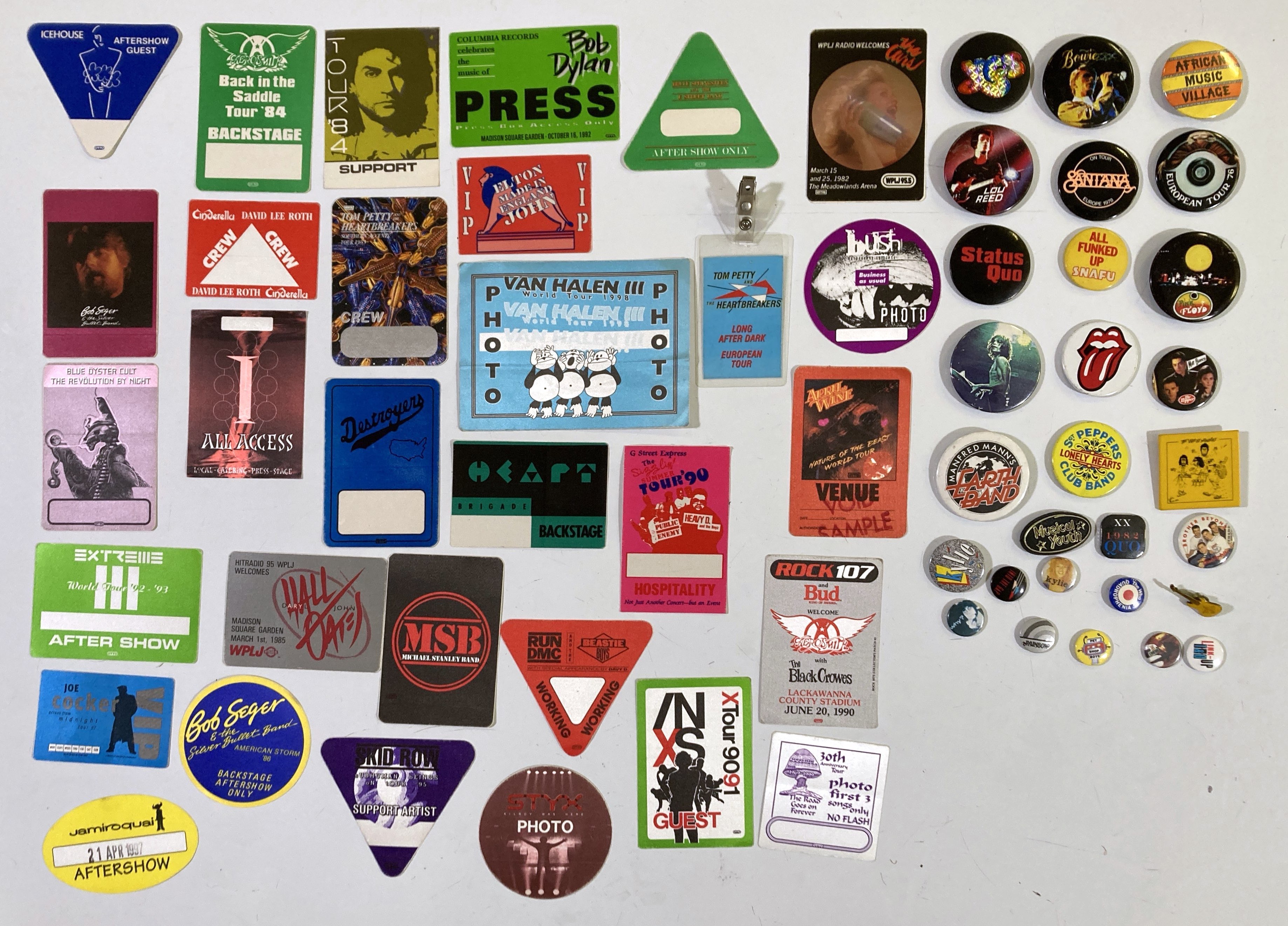 Lot 104 CONCERT MEMORABILIA BADGES AND TOUR PASSES.