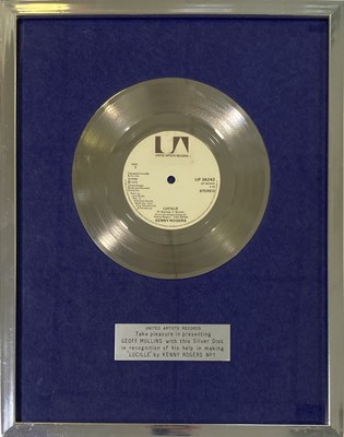 Lot 369 - KENNY ROGERS - A SALES AWARD AND A SIGNED BOOKLET.