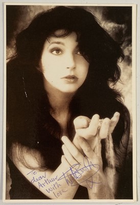 Lot 346 - KATE BUSH - A SIGNED POSTCARD.