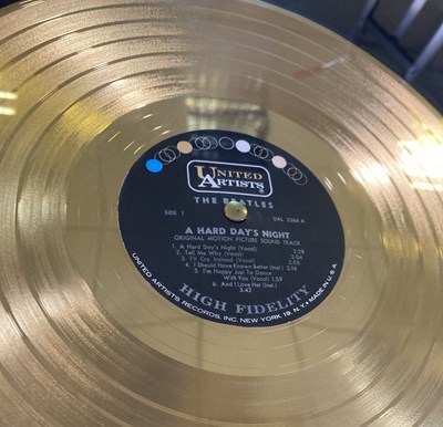 Lot 530 - THE BEATLES - A HARD DAY'S NIGHT GOLD DISC