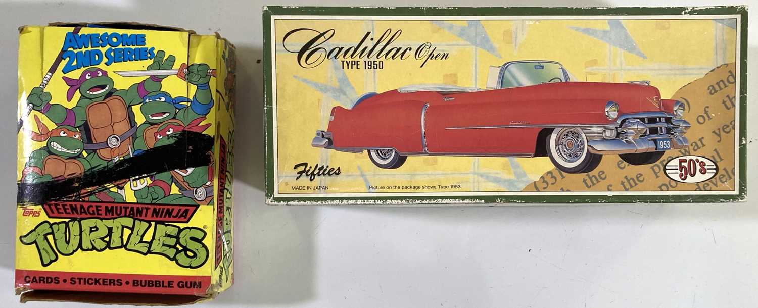 Lot 84 - TEENAGE MUTANT NINJA TURTLES COMPLETE BOX OF UNOPENED TOPPS CARDS / A CADILLAC 'FIFTIES' CAR.