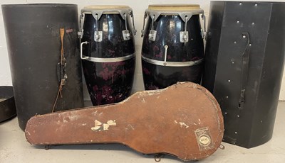 Lot 8 - STRAWBERRY STUDIOS - STRAWBERRY RENTALS COLLECTION - BONGOS AND 10CC USED GUITAR CASE.
