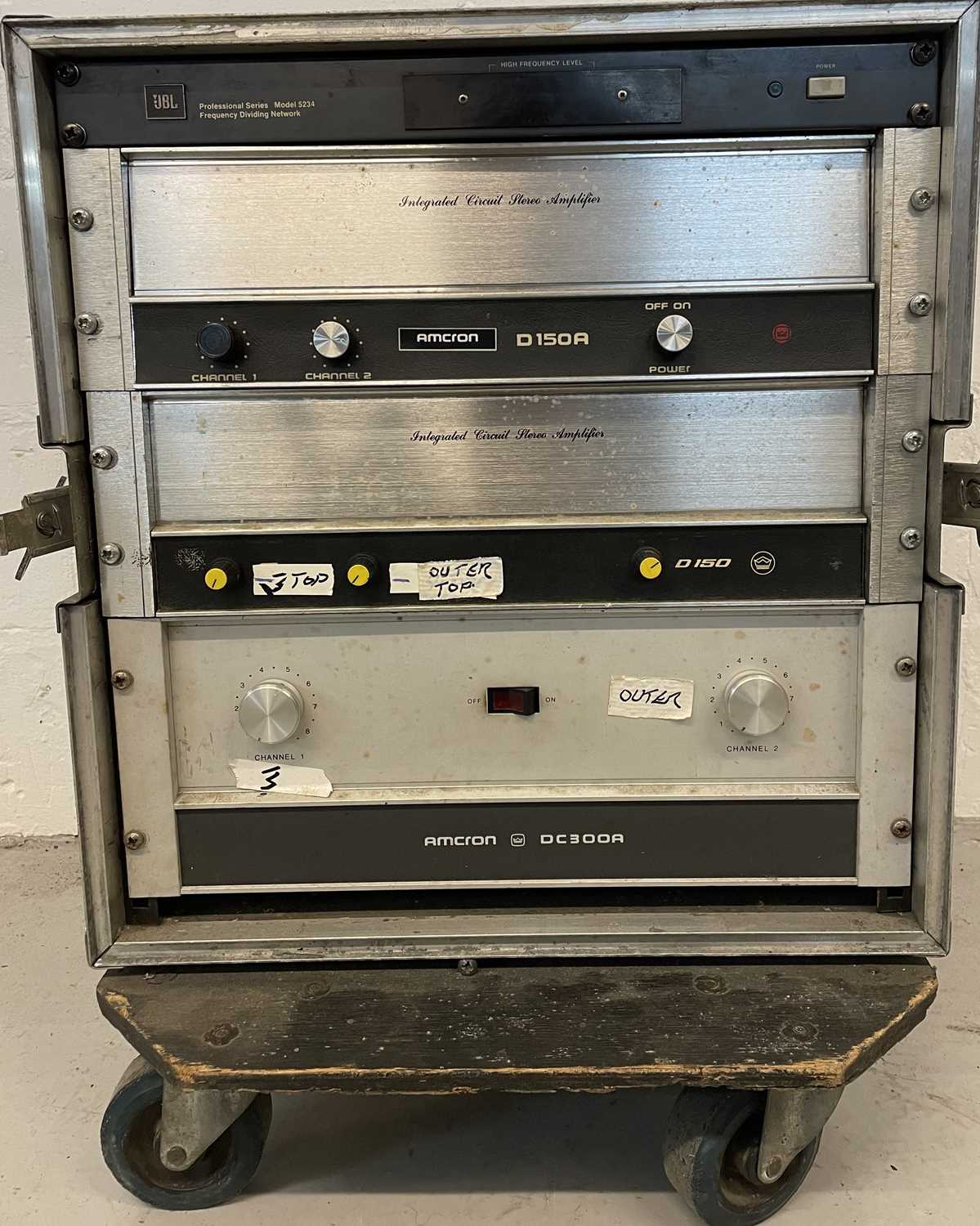 Lot 10 - STRAWBERRY STUDIOS - STRAWBERRY RENTALS COLLECTION - FLIGHT CASE WITH AMCRON DC300A AMPS.
