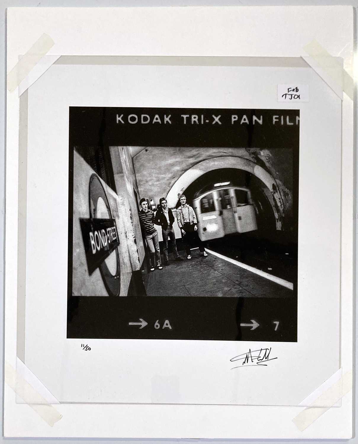 Lot 377 - THE JAM - MARTYN GODDARD -SIGNED LIMITED EDITION 'DOWN IN THE TUBE STATION' PHOTOGRAPH.