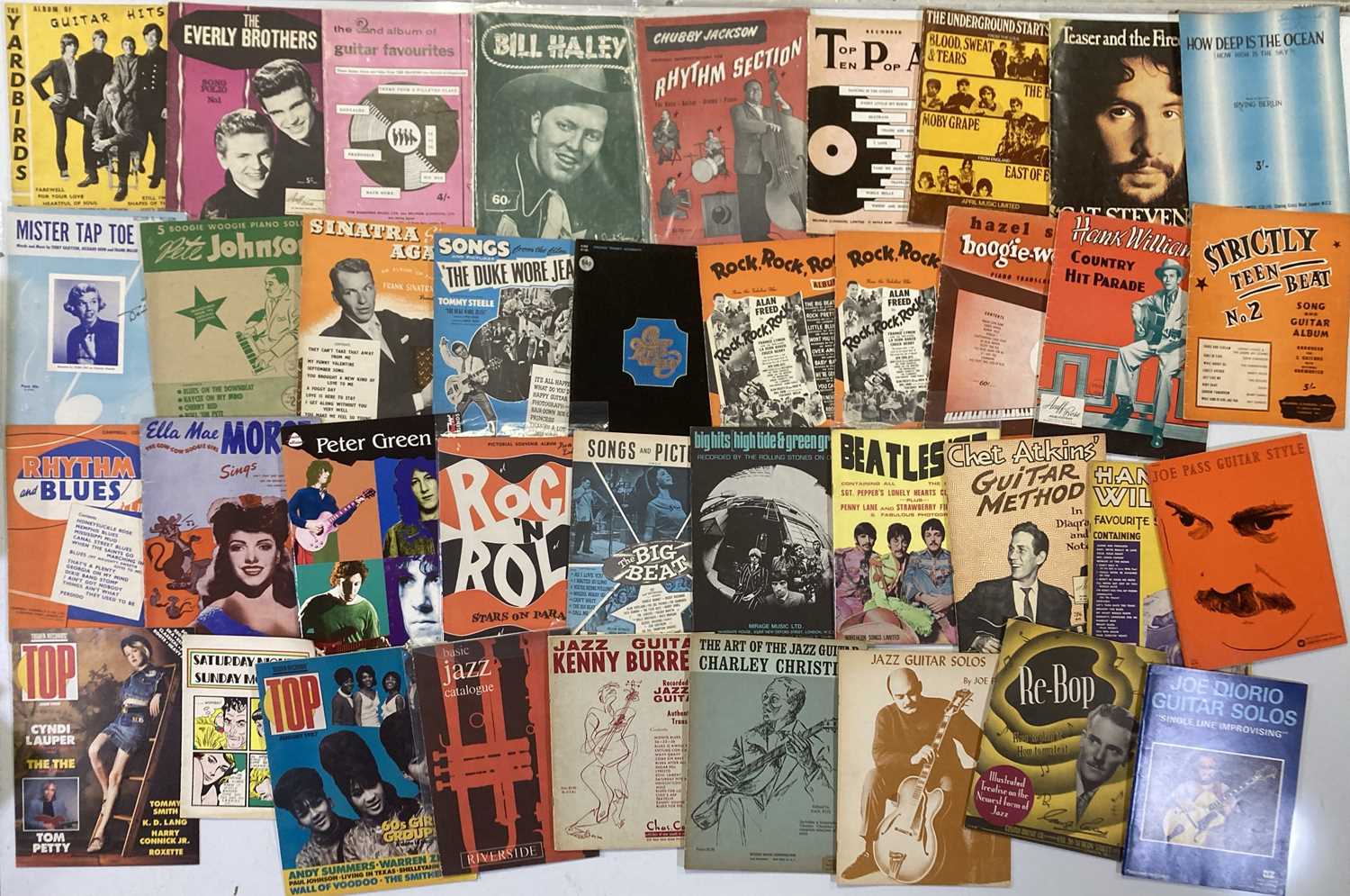 Lot 114 - ROCK AND ROLL - POP MUSIC- SHEET MUSIC AND MUSIC BOOKS.