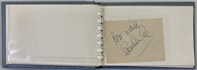 Lot 265 - AUTOGRAPH BOOK INC MICK JAGGER.