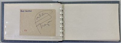 Lot 265 - AUTOGRAPH BOOK INC MICK JAGGER.