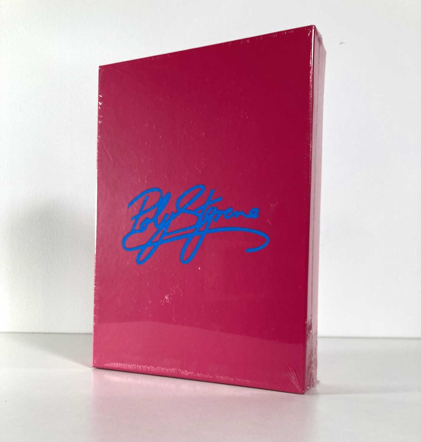 Lot 899 - X-RAY SPEX - DAYGLO: THE POLY STYRENE STORY 7" + INSERTS (DELUXE LIMITED EDITION BOX-SET EDITION)