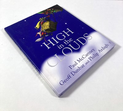Lot 132 - THE BEATLES - HIGH IN THE CLOUDS BOOK SIGNED BY PAUL MCCARTNEY.