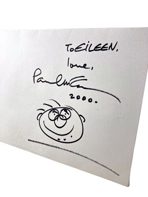Lot 135 - THE BEATLES - SIGNATURE AND DOODLE BY PAUL MCCARTNEY.