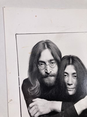 Lot 115 - THE BEATLES - JOHN LENNON / YOKO ONO - SIGNED PRINT BY IAIN MACMILLAN.