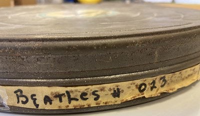 Lot 127 - KING FEATURES BEATLES SHOW FILM REEL & CAN PLUS FILM STRIPS & 8MM FILM.