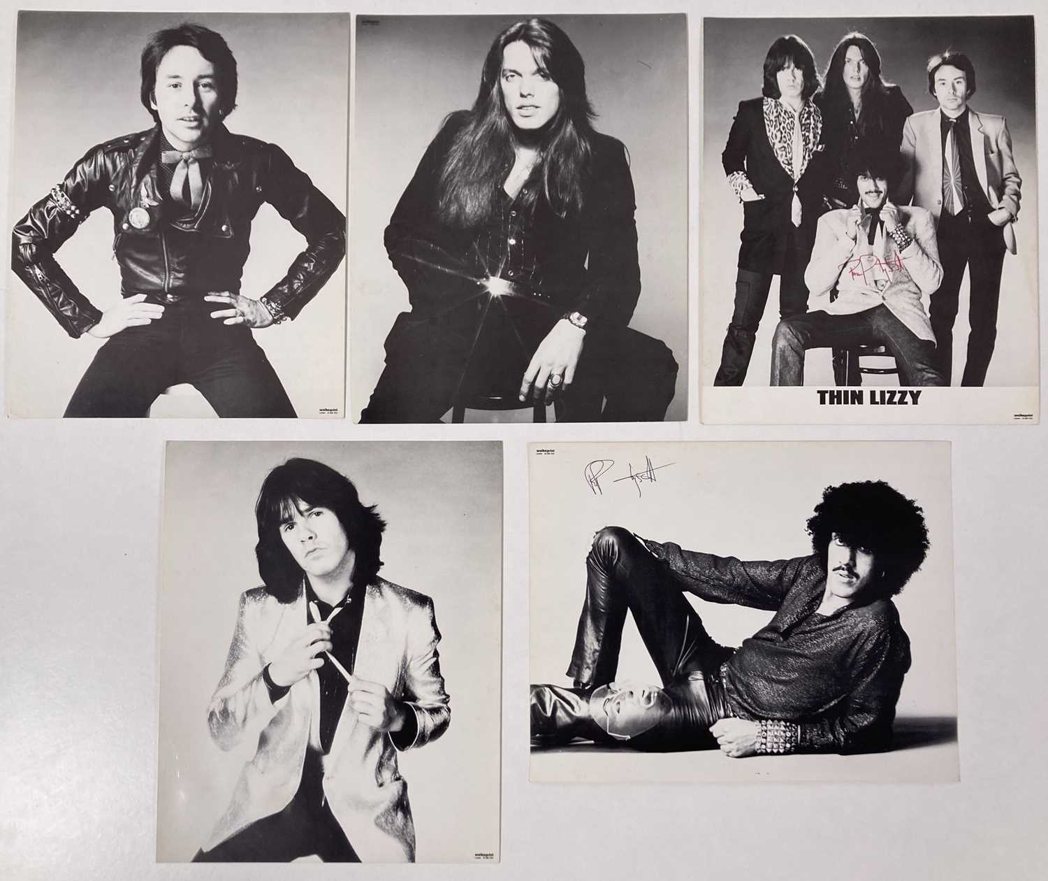 Lot 332 - THIN LIZZY - PROMOTIONAL PHOTOGRAPHS - TWO SIGNED BY PHIL LYNOTT.