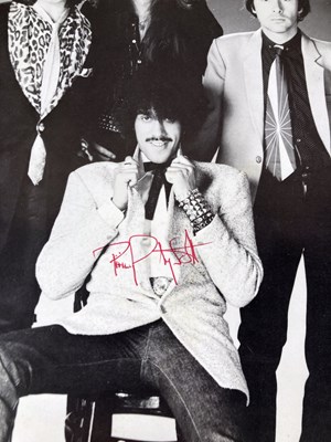 Lot 332 - THIN LIZZY - PROMOTIONAL PHOTOGRAPHS - TWO SIGNED BY PHIL LYNOTT.