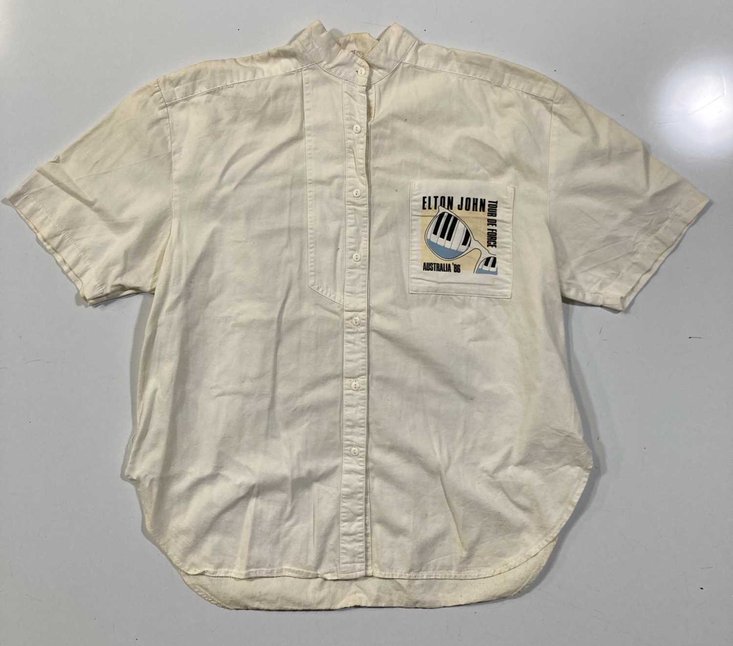 Lot 352 - ELTON JOHN - A 1986 TOUR SHIRT OWNED AND WORN BY ELTON JOHN.