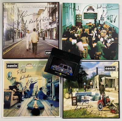 Lot 498 - OASIS MEMORABILIA - BRIAN CANNON SIGNED LPS / PRETTY GREEN TAXI.