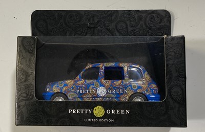 Lot 498 - OASIS MEMORABILIA - BRIAN CANNON SIGNED LPS / PRETTY GREEN TAXI.