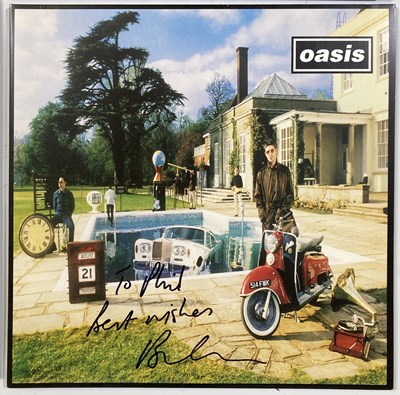 Lot 498 - OASIS MEMORABILIA - BRIAN CANNON SIGNED LPS / PRETTY GREEN TAXI.