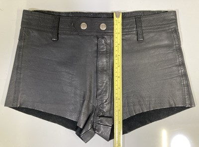 Lot 519 - QUEEN - FREDDIE MERCURY OWNED AND STAGEWORN LEATHER SHORTS.