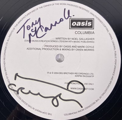 Lot 499 - OASIS - COLUMBIA DEMO REISSUE SIGNED BY TONY MCCAROLL / NOEL GALLAGHER.
