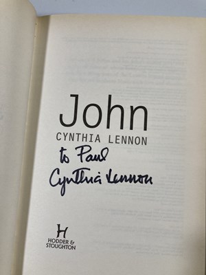 Lot 140 - GEORGE MARTIN / CYNTHIA LENNON SIGNED BOOKS.