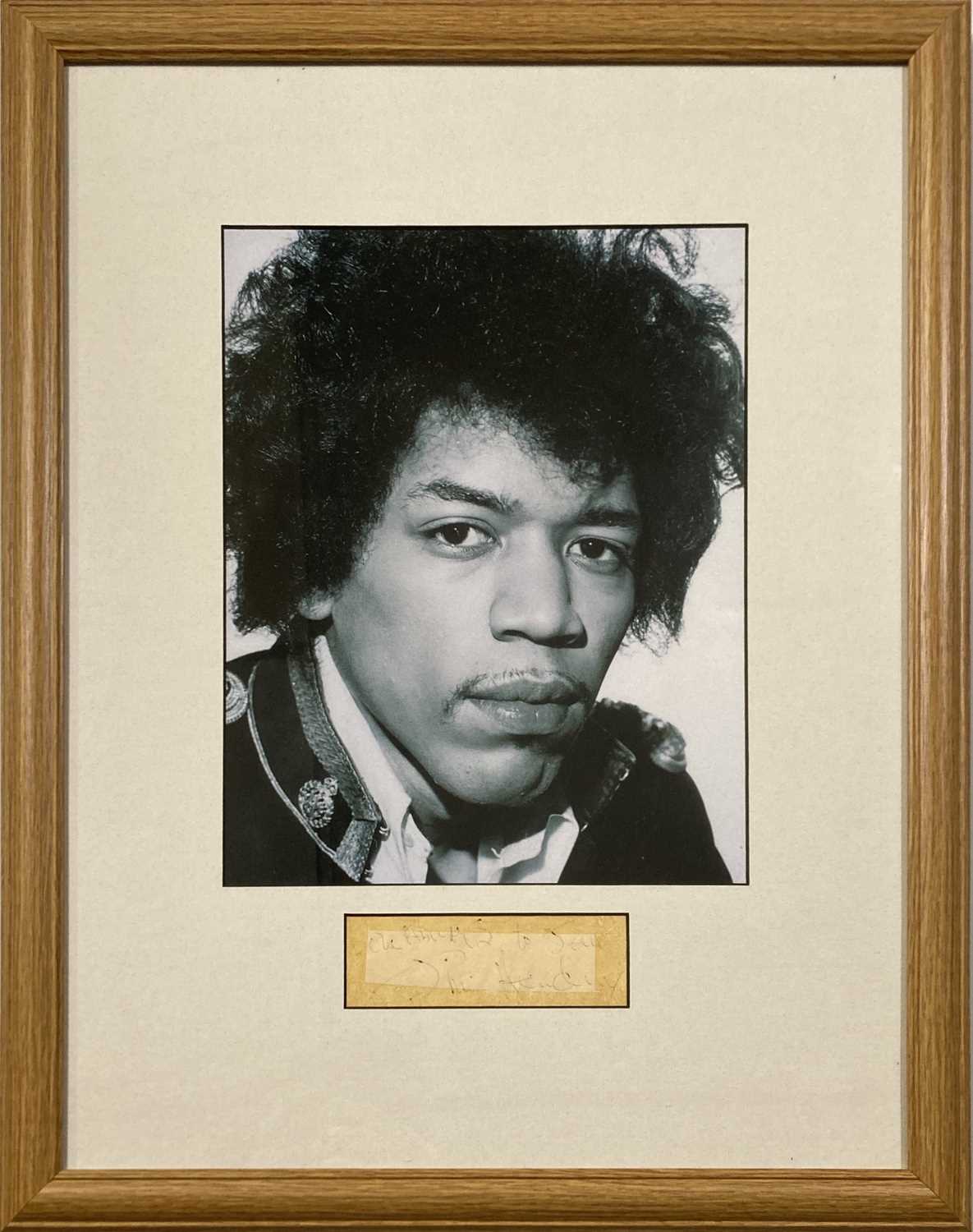 Lot 416 - JIMI HENDRIX - SIGNED PAGE.