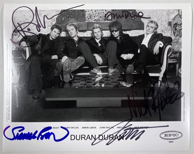 Lot 298 - DURAN DURAN - A FULLY SIGNED PHOTOGRAPH.