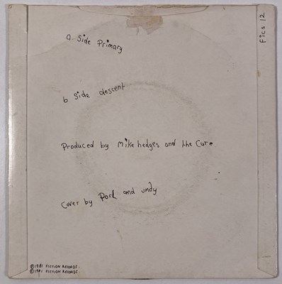 Lot 303 - THE CURE - A 7" SINGLE SIGNED BY THE BAND.