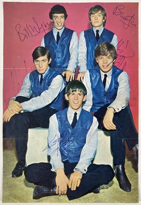 Lot 406 - THE ROLLING STONES - A SIGNED MAGAZINE CUTTING.