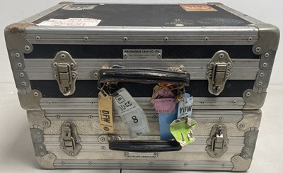 Lot 34 - STRAWBERRY STUDIOS - STRAWBERRY RENTALS COLLECTION - 10CC USED CASES ADORNED WITH STAGE PASSES.